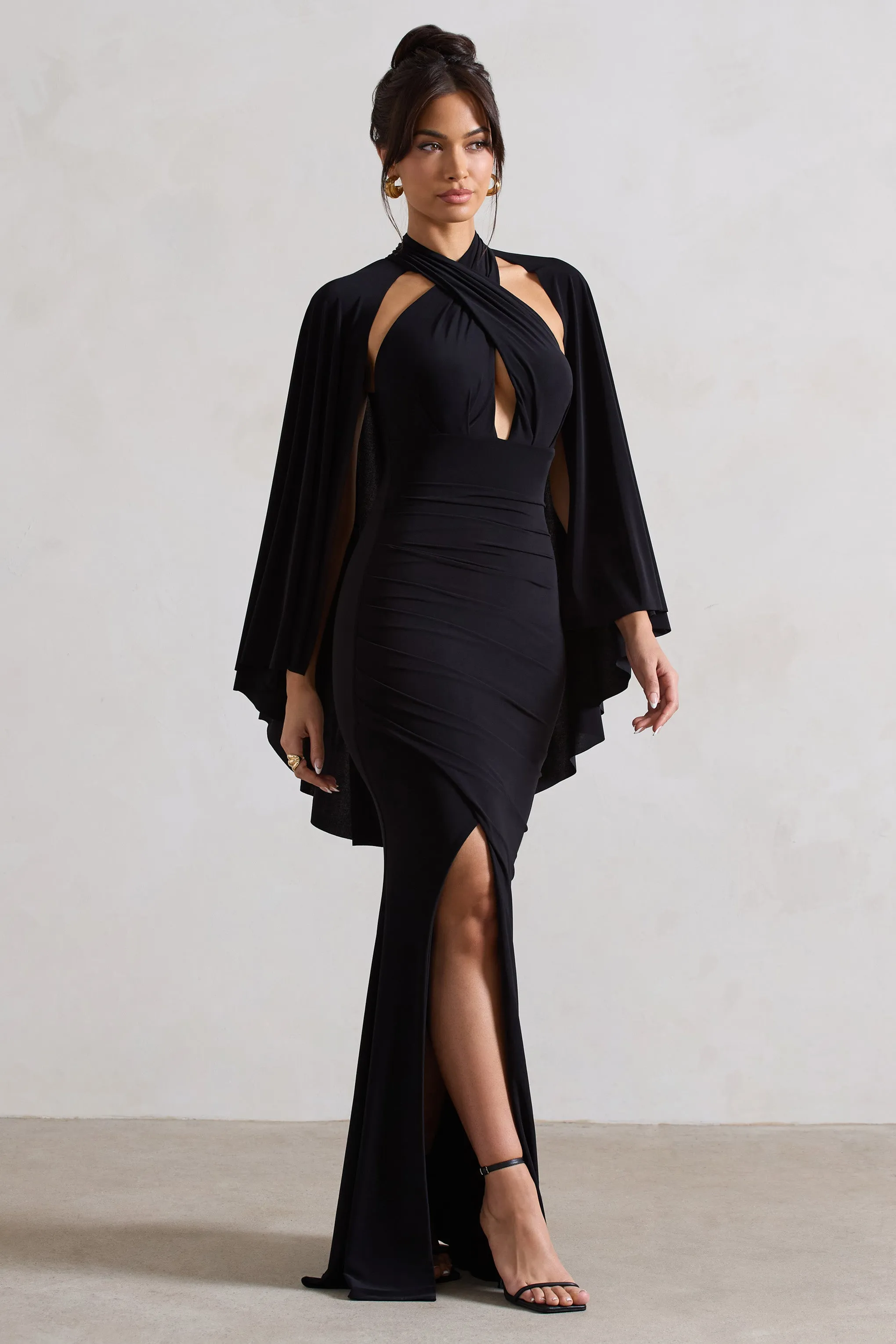 Audrina | Black Ruched Halter-Neck Split Maxi Dress With Cape Club L London