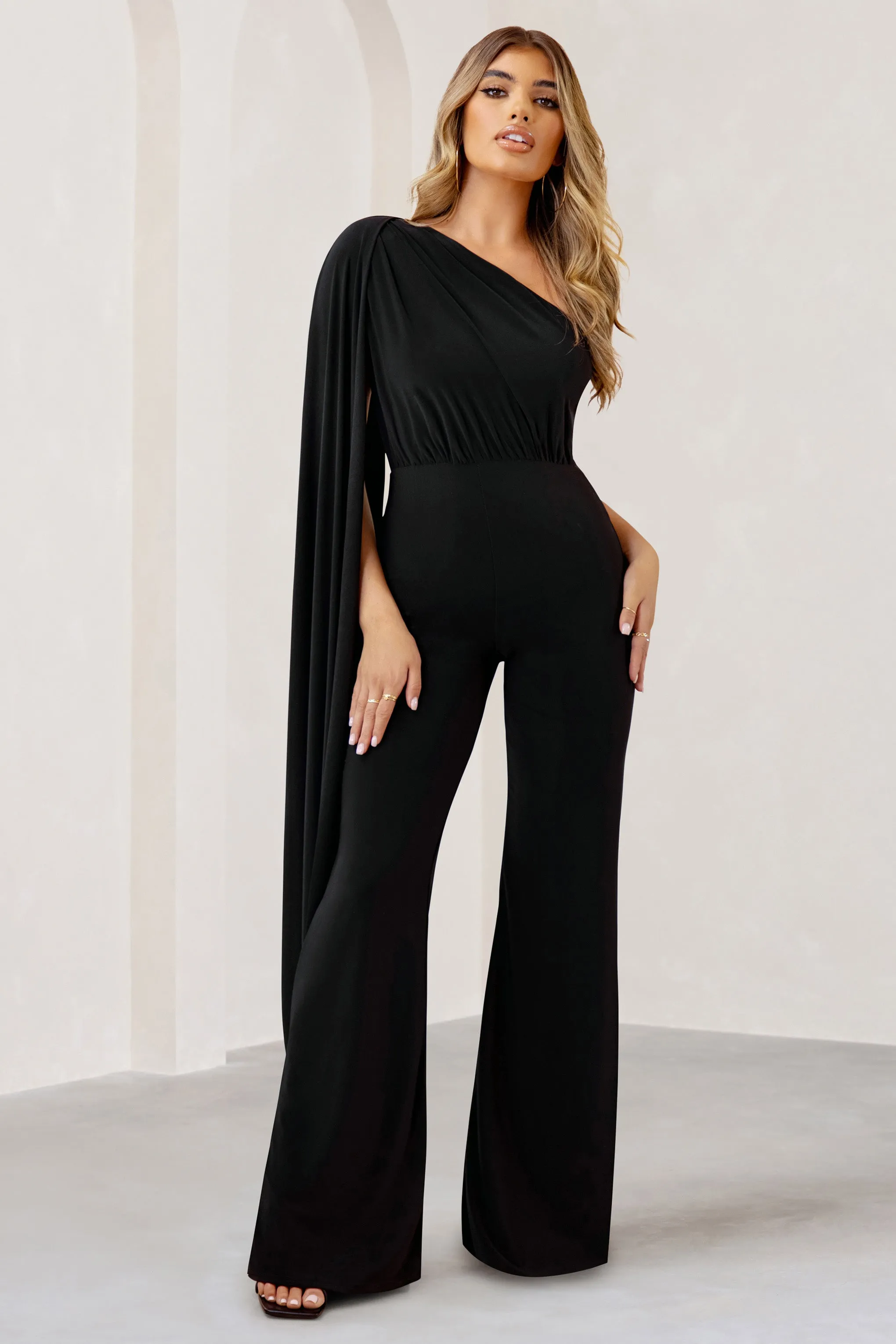 Aurora | Black One Shoulder Cape Sleeve Jumpsuit Club L London