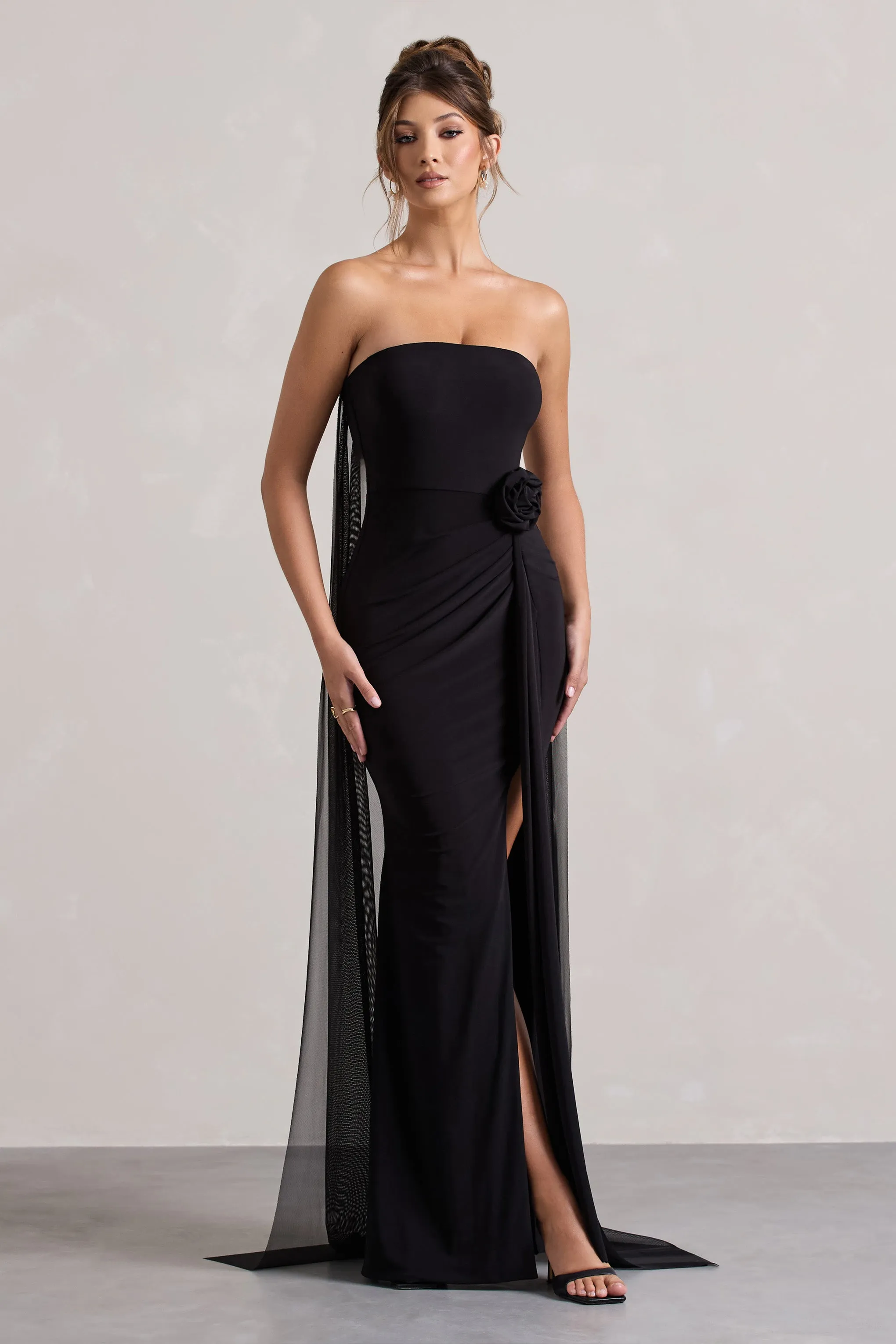 More To Come | Black Strapless Wrap Cape Maxi Dress With Corsage Club L London