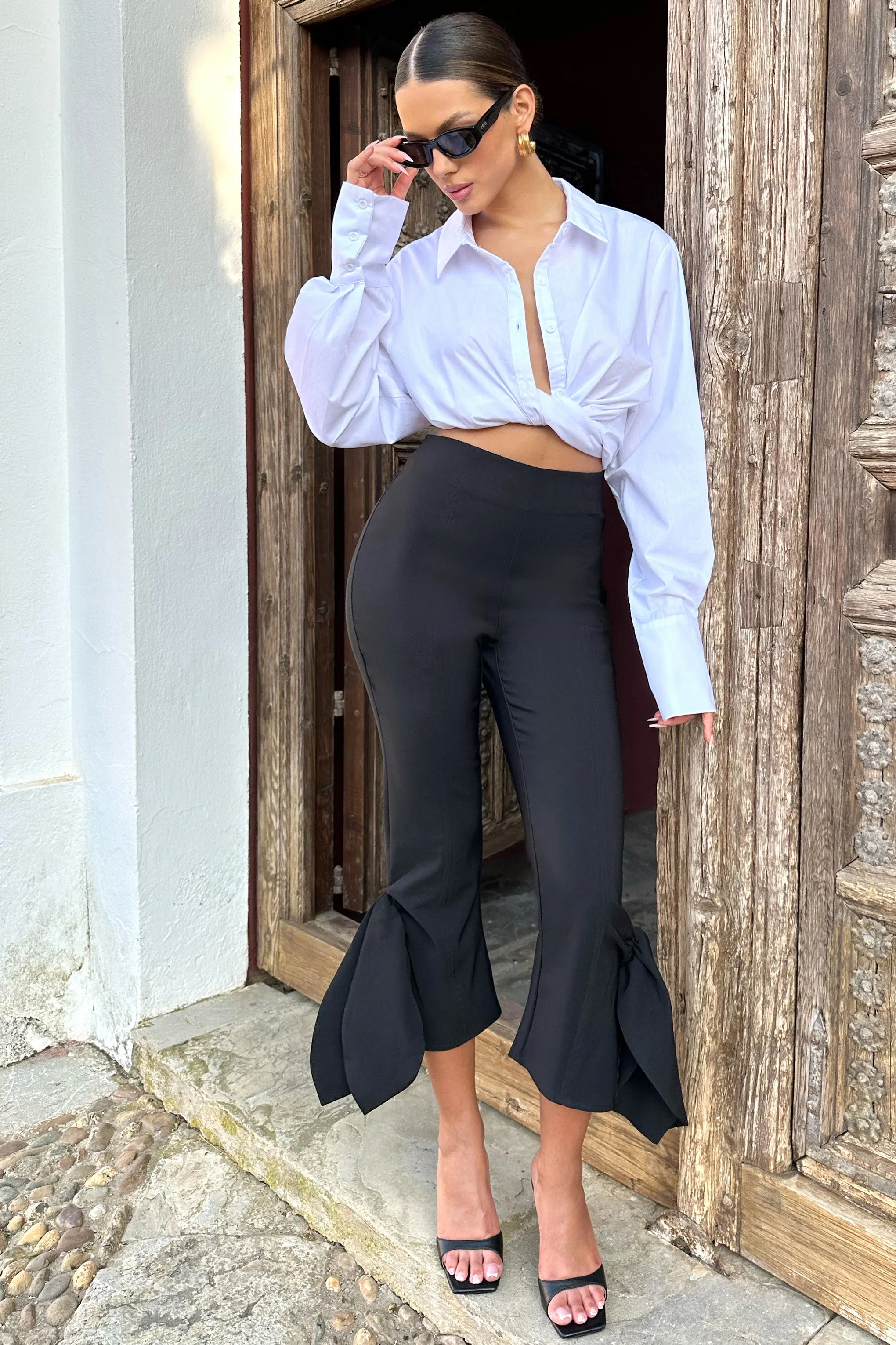 On Stage | Black Cropped Capri Pants With Knot Detail Club L London