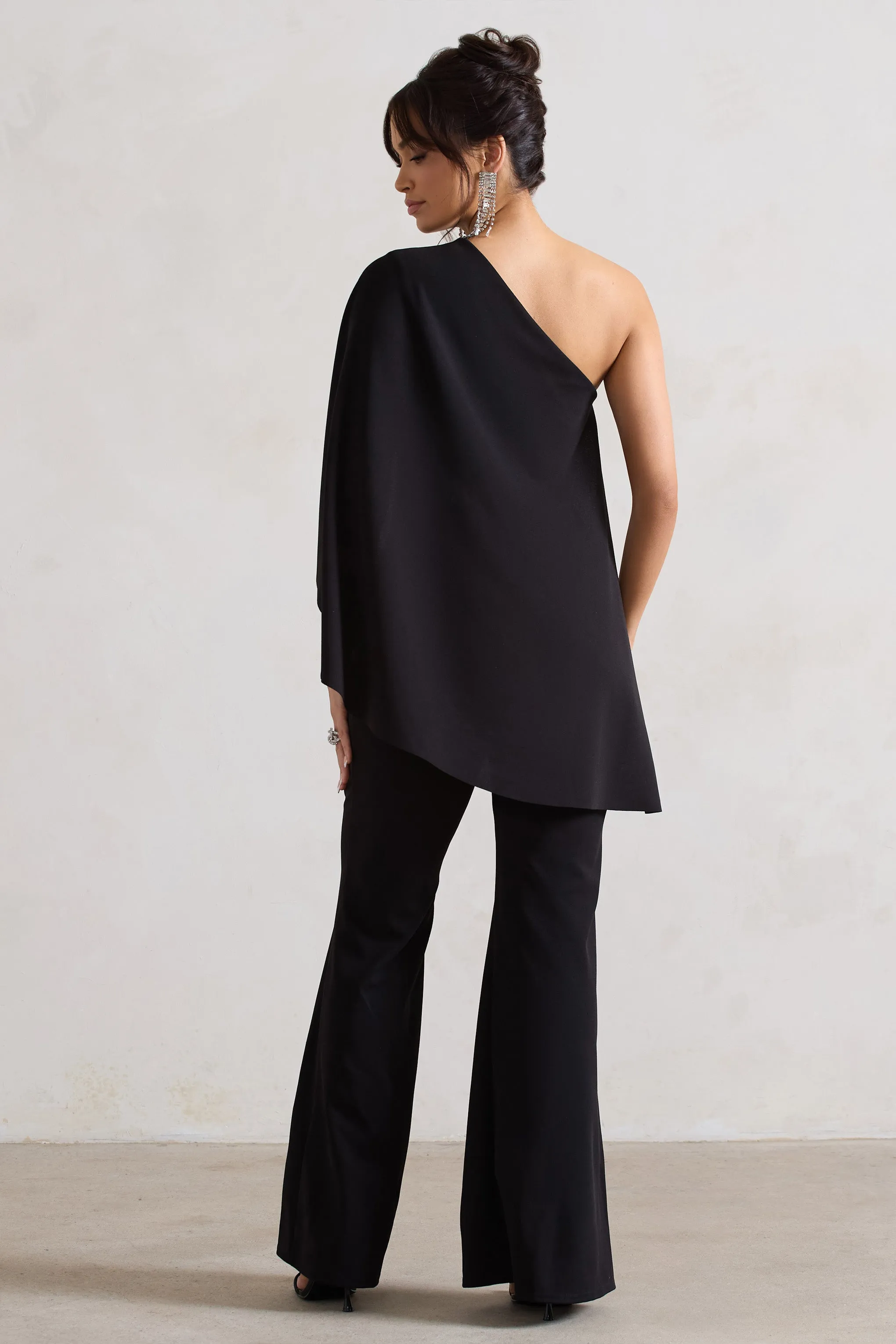Pristine | Black One Shoulder Cape Sleeve Flared-Leg Jumpsuit Club L London