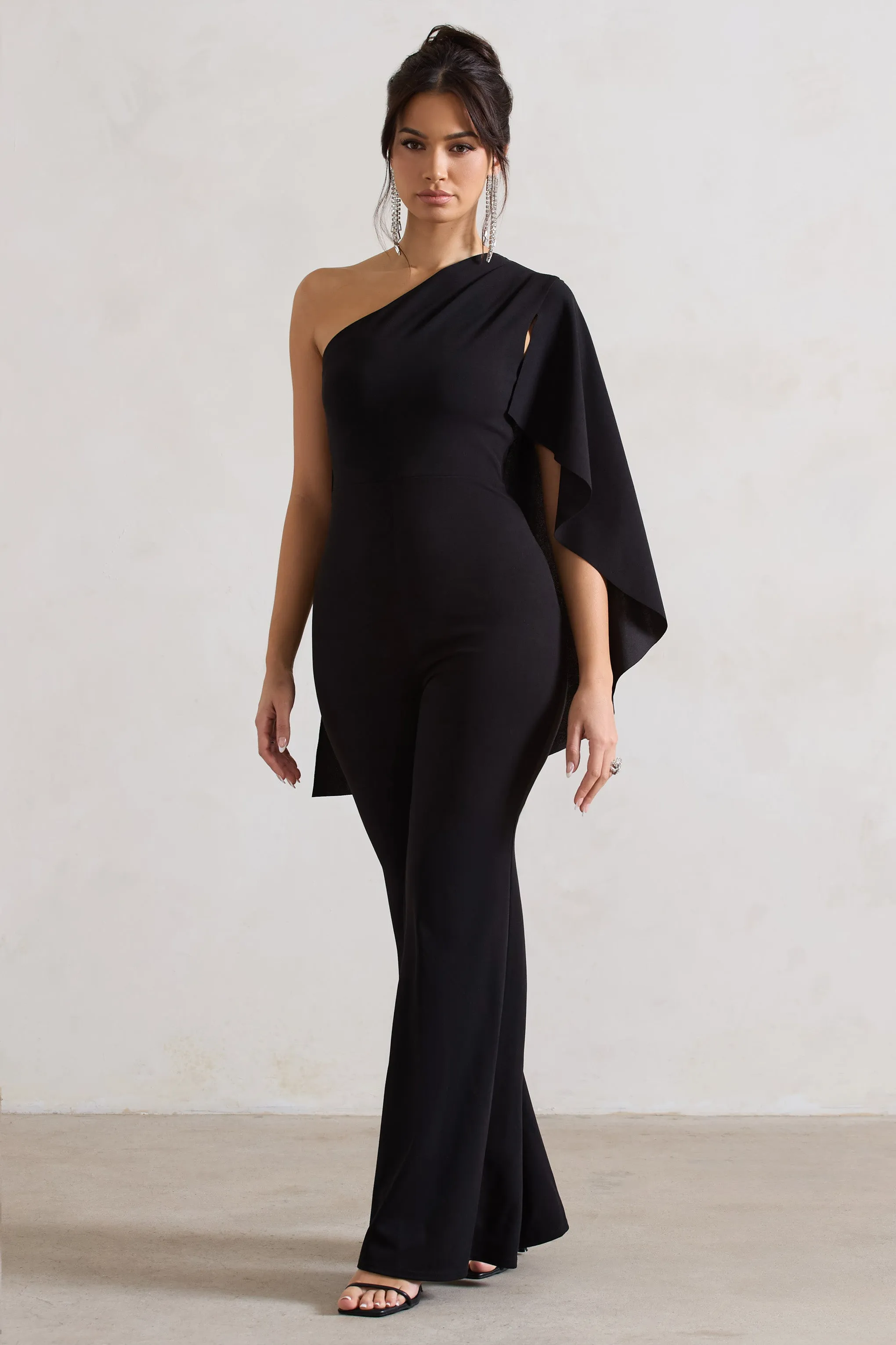 Pristine | Black One Shoulder Cape Sleeve Flared-Leg Jumpsuit Club L London