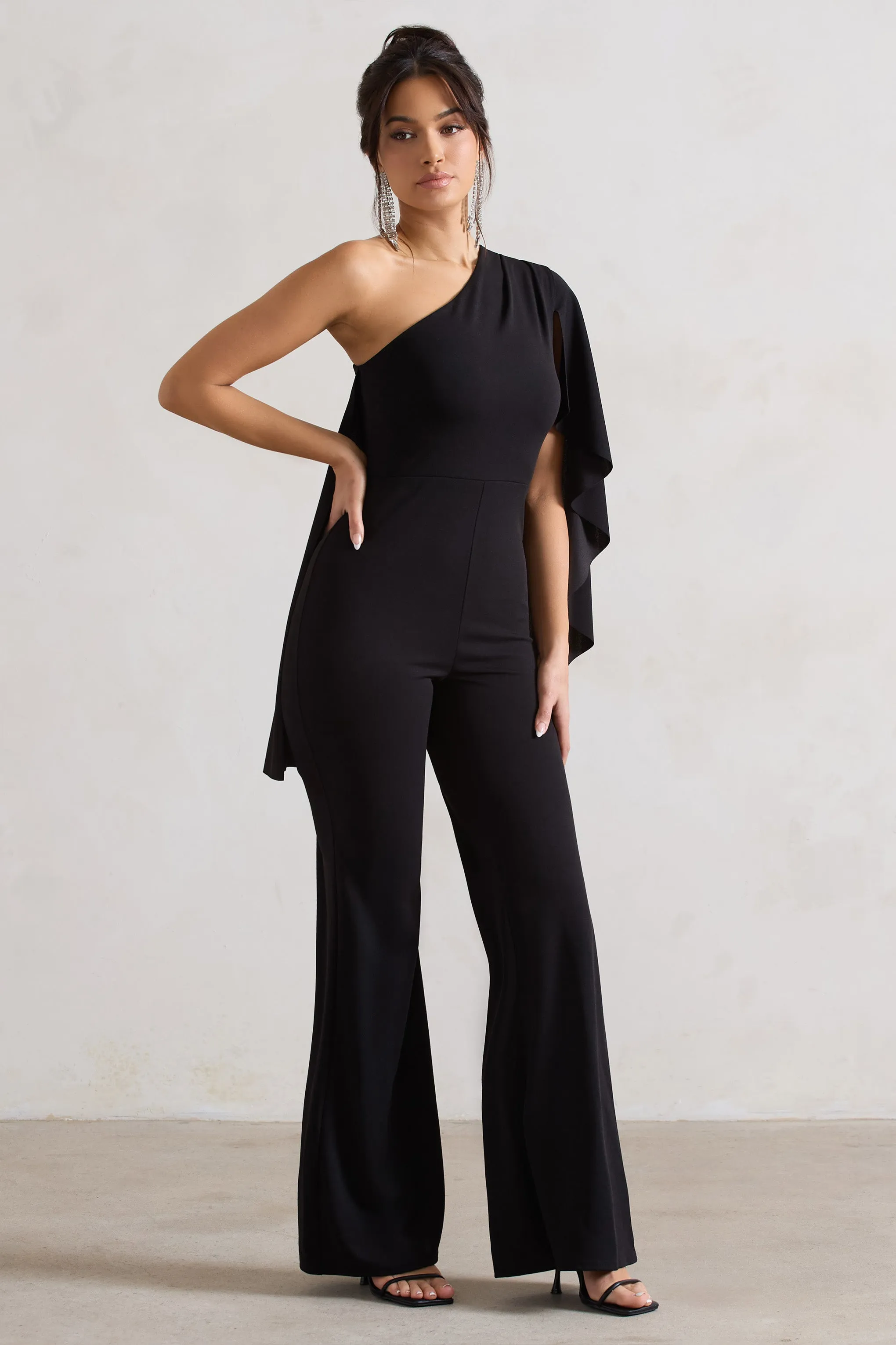 Pristine | Black One Shoulder Cape Sleeve Flared-Leg Jumpsuit Club L London