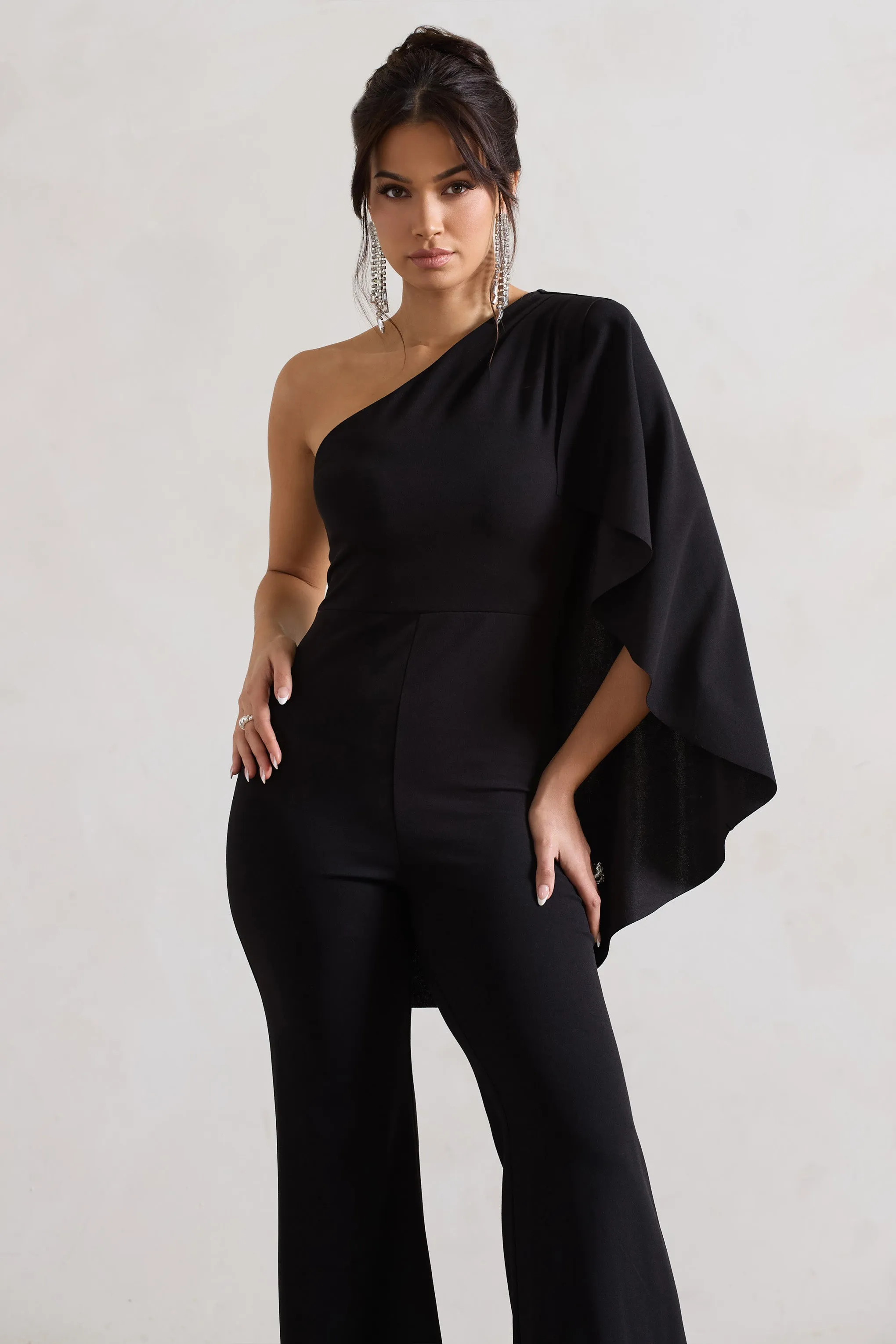 Pristine | Black One Shoulder Cape Sleeve Flared-Leg Jumpsuit Club L London