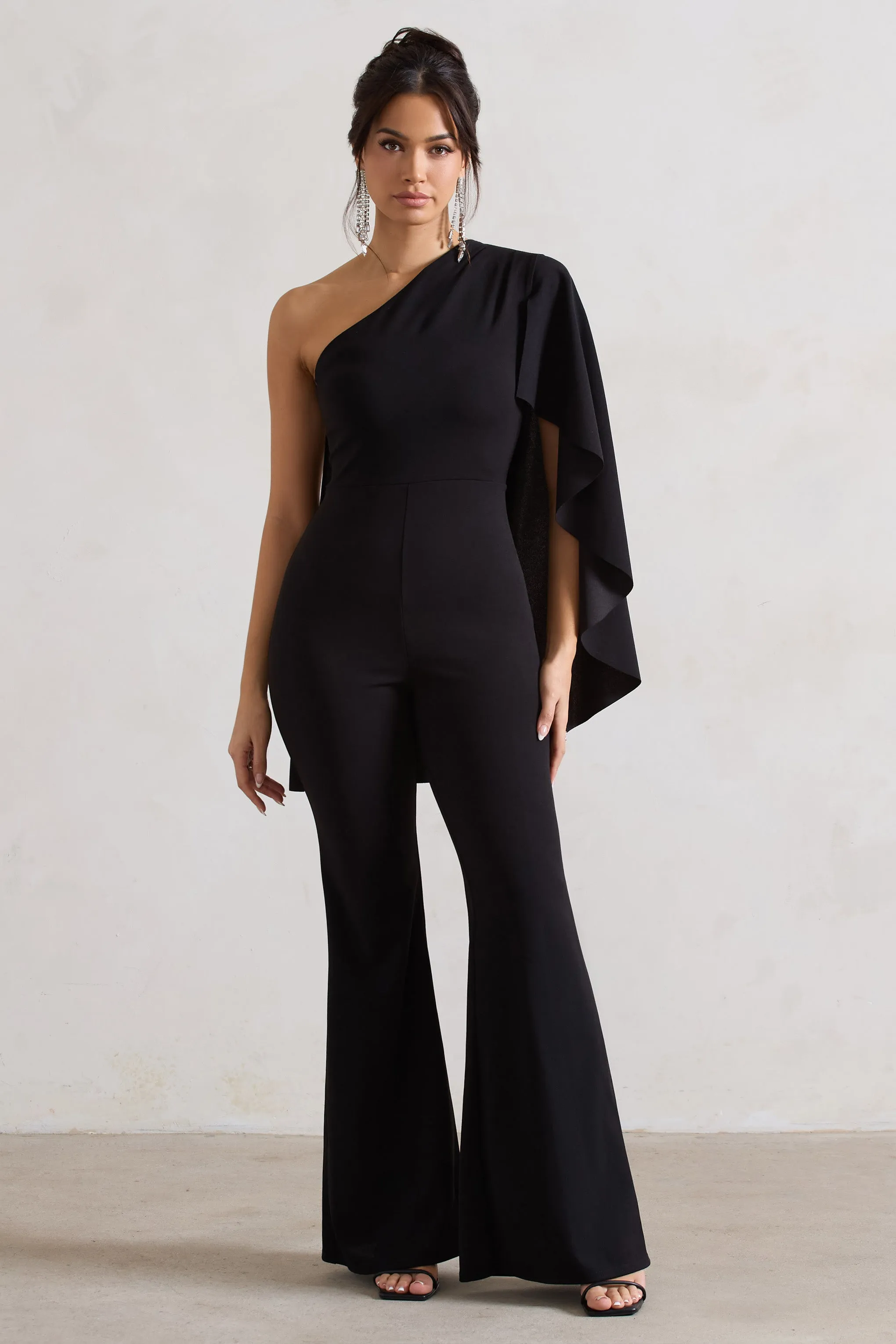 Pristine | Black One Shoulder Cape Sleeve Flared-Leg Jumpsuit Club L London