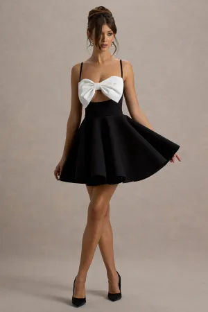 Yasmina | Black & White Bow Skater Mini Dress Club L London