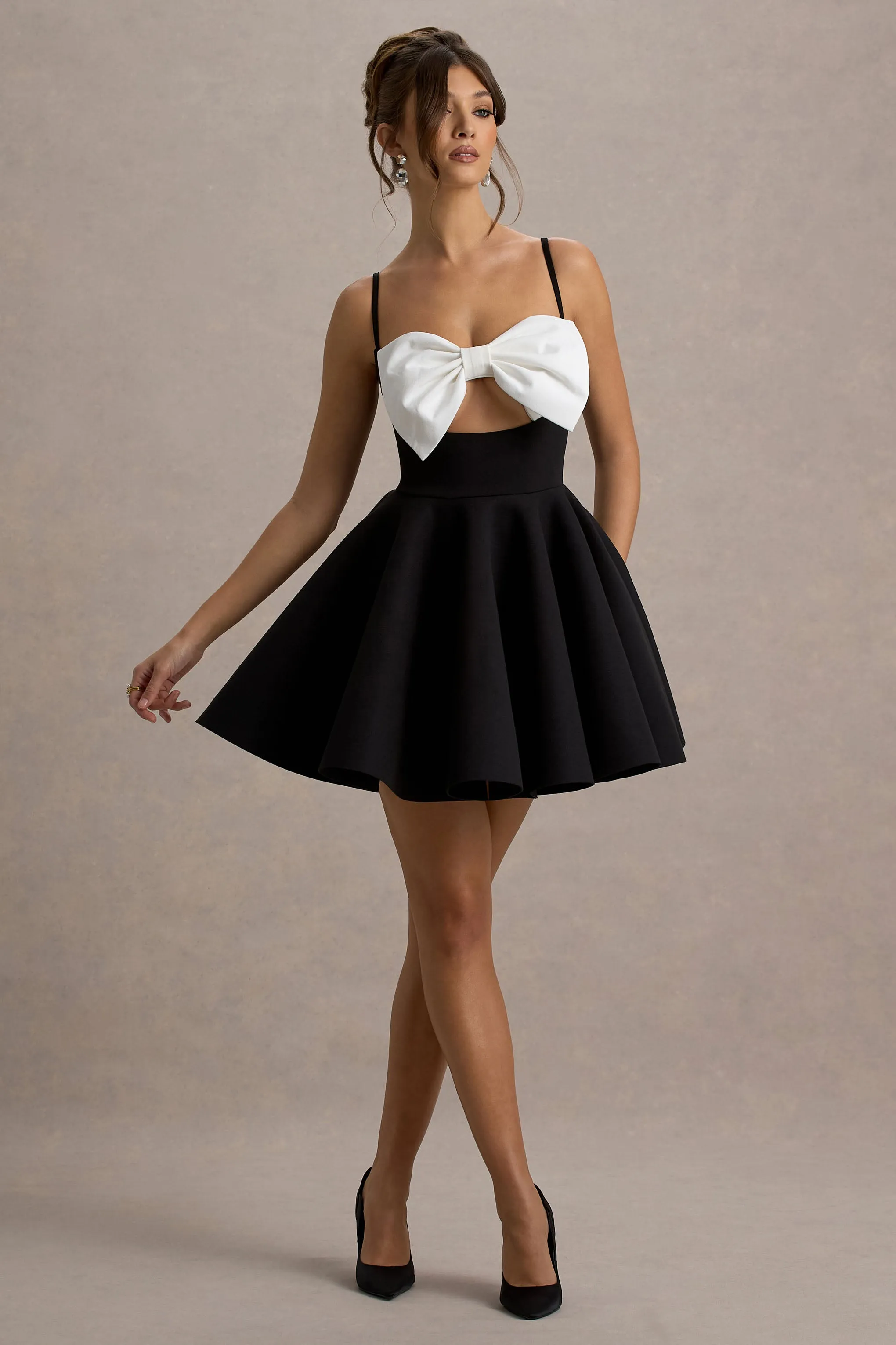 Yasmina | Black & White Bow Skater Mini Dress Club L London