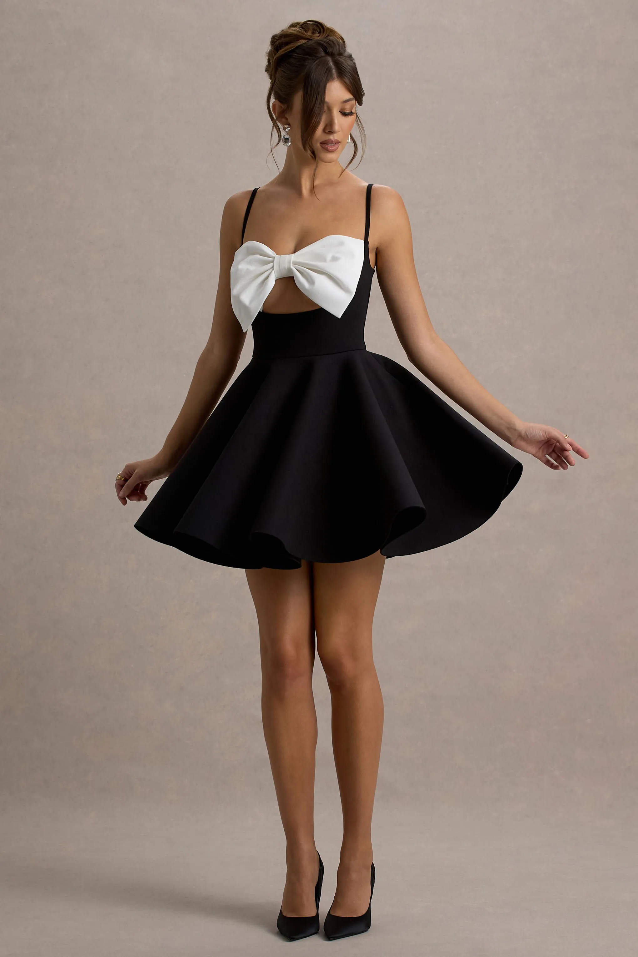 Yasmina | Black & White Bow Skater Mini Dress Club L London
