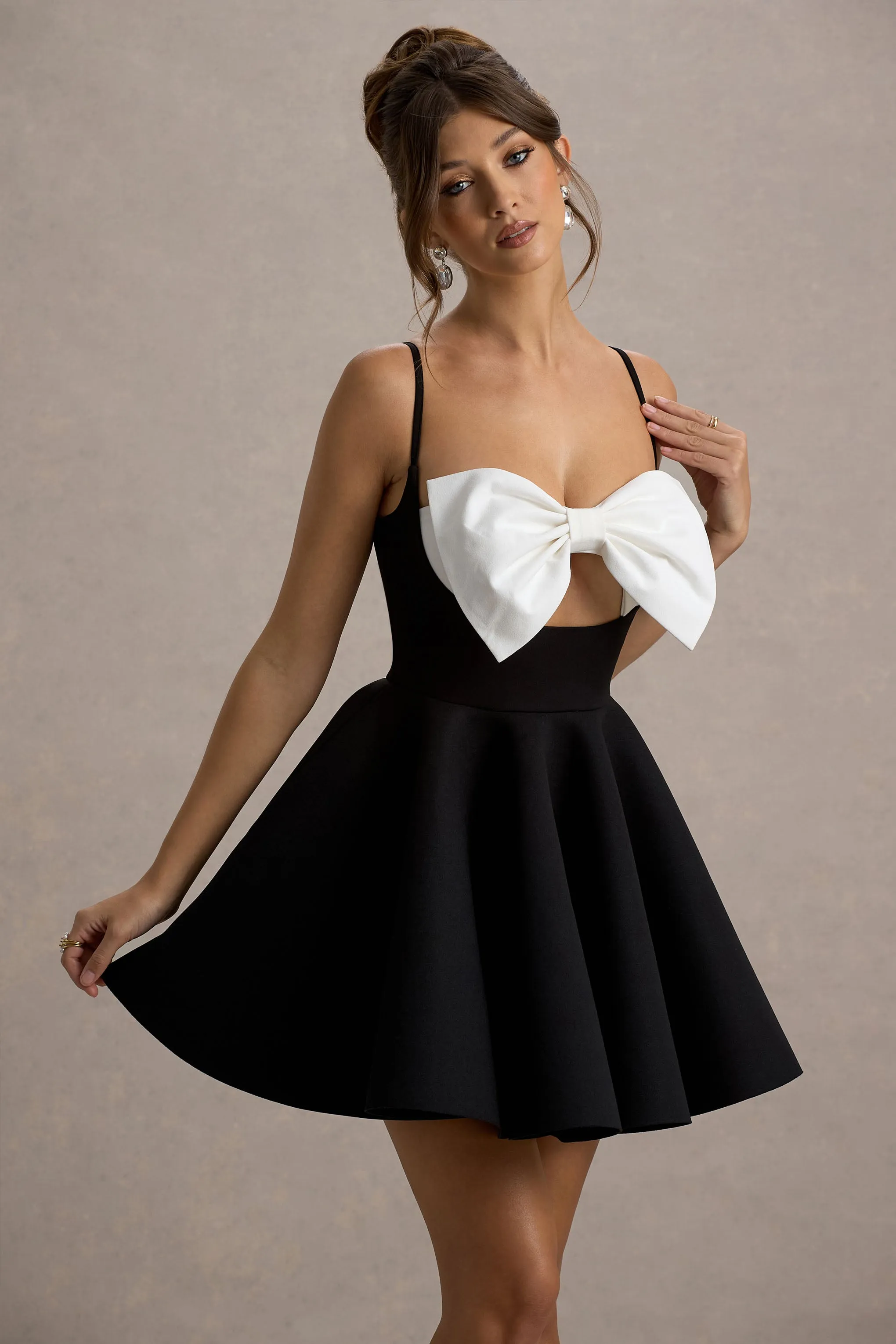 Yasmina | Black & White Bow Skater Mini Dress Club L London