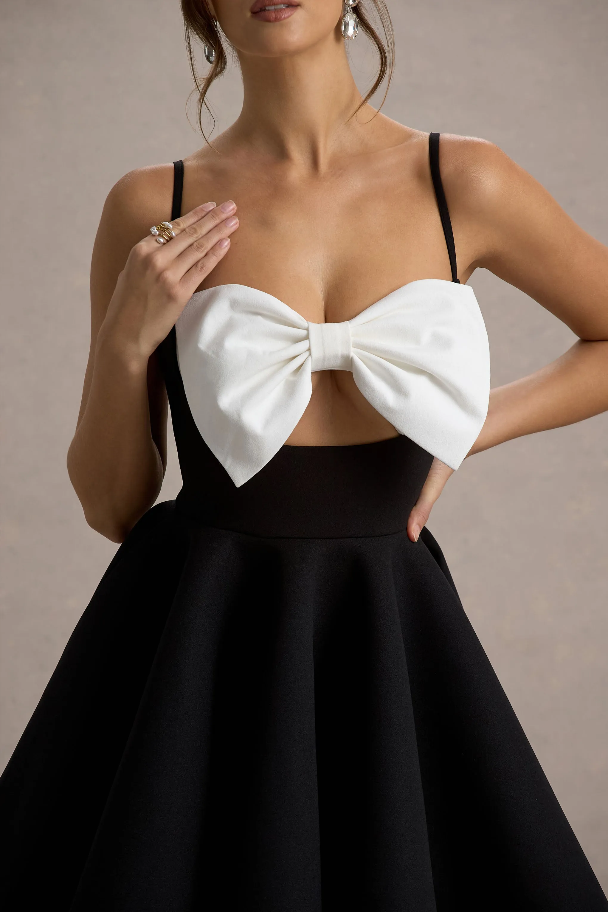Yasmina | Black & White Bow Skater Mini Dress Club L London